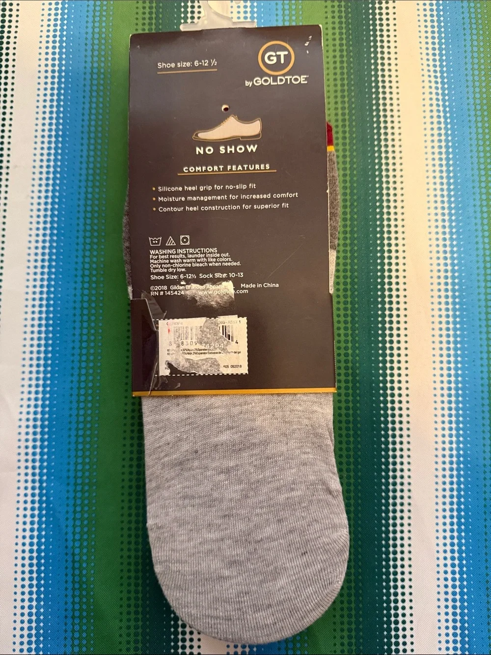 Goldtoe GT Men’s No-Show Socks in Light Gray with Stripes and other colors.
